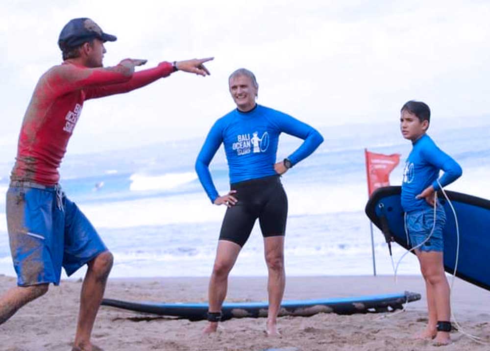 surf lesson by surf instructor at bali ocean surf at seminyak